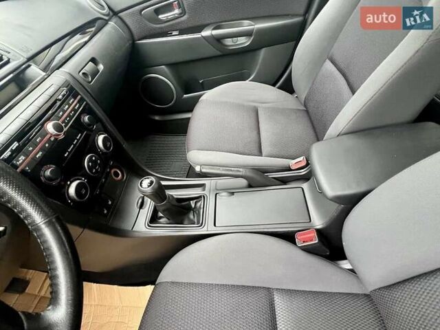 Серый Мазда 3, объемом двигателя 1.6 л и пробегом 183 тыс. км за 6499 $, фото 56 на Automoto.ua