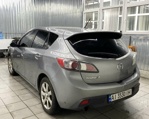 Сірий Мазда 3, об'ємом двигуна 1.56 л та пробігом 240 тис. км за 4700 $, фото 6 на Automoto.ua