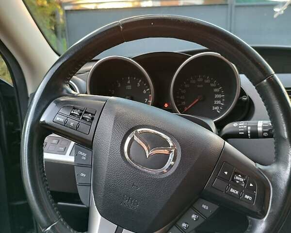 Серый Мазда 3, объемом двигателя 1.6 л и пробегом 150 тыс. км за 7850 $, фото 30 на Automoto.ua