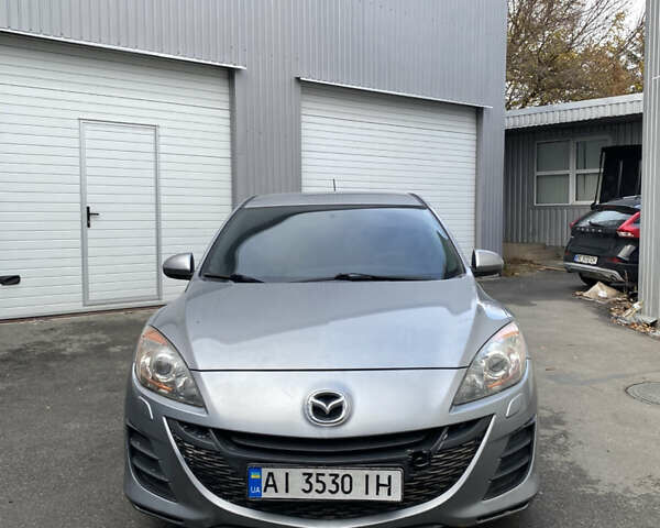 Серый Мазда 3, объемом двигателя 1.56 л и пробегом 240 тыс. км за 4700 $, фото 1 на Automoto.ua