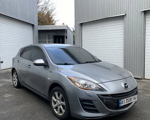 Серый Мазда 3, объемом двигателя 1.56 л и пробегом 240 тыс. км за 4700 $, фото 2 на Automoto.ua