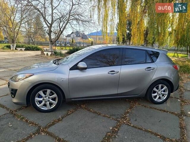 Серый Мазда 3, объемом двигателя 1.6 л и пробегом 240 тыс. км за 5999 $, фото 5 на Automoto.ua