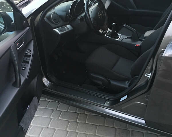 Серый Мазда 3, объемом двигателя 1.6 л и пробегом 210 тыс. км за 6500 $, фото 8 на Automoto.ua