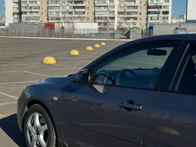 Сірий Мазда 3, об'ємом двигуна 2 л та пробігом 302 тис. км за 4500 $, фото 5 на Automoto.ua