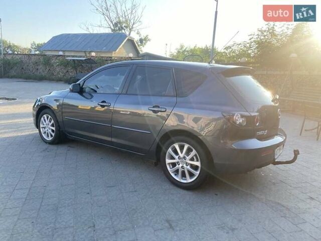Серый Мазда 3, объемом двигателя 1.6 л и пробегом 210 тыс. км за 5899 $, фото 2 на Automoto.ua