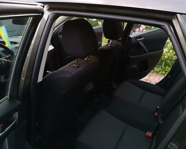 Серый Мазда 3, объемом двигателя 1.6 л и пробегом 150 тыс. км за 7850 $, фото 14 на Automoto.ua