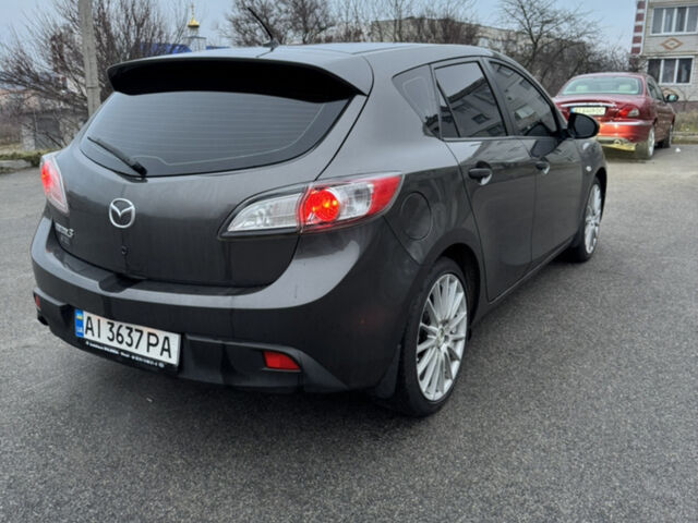 Серый Мазда 3, объемом двигателя 1.6 л и пробегом 195 тыс. км за 6900 $, фото 1 на Automoto.ua