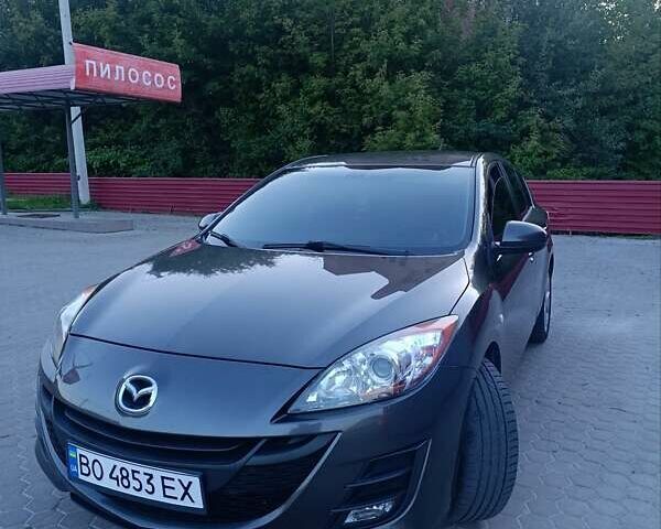 Серый Мазда 3, объемом двигателя 1.56 л и пробегом 250 тыс. км за 7600 $, фото 1 на Automoto.ua