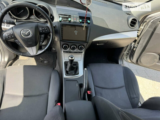 Сірий Мазда 3, об'ємом двигуна 2.18 л та пробігом 206 тис. км за 6999 $, фото 23 на Automoto.ua