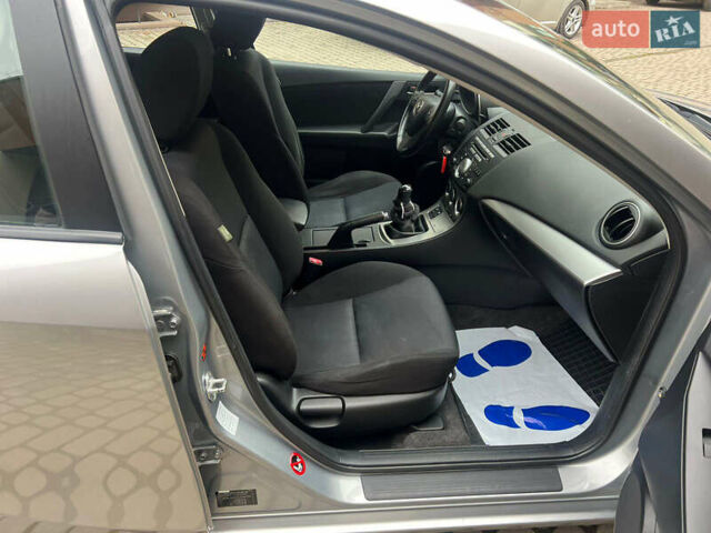 Сірий Мазда 3, об'ємом двигуна 1.6 л та пробігом 156 тис. км за 7599 $, фото 18 на Automoto.ua