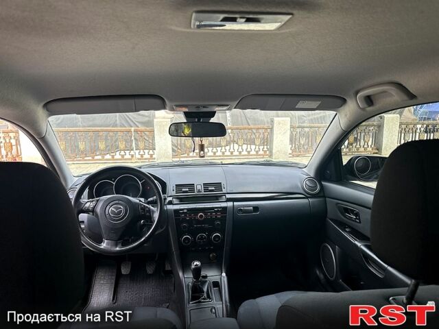 Серый Мазда 3, объемом двигателя 1.6 л и пробегом 208 тыс. км за 5500 $, фото 8 на Automoto.ua