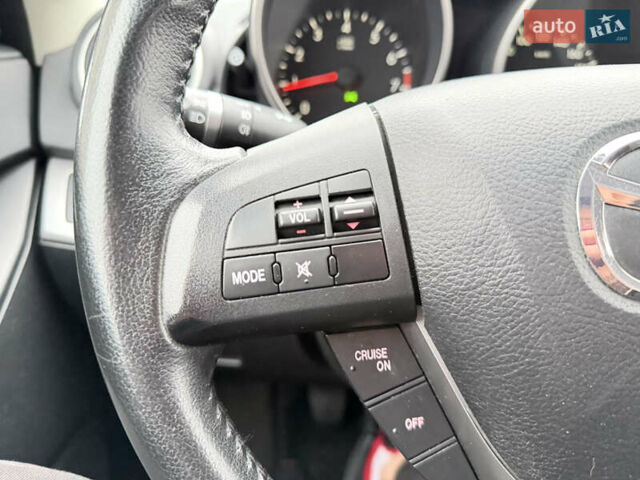 Серый Мазда 3, объемом двигателя 1.6 л и пробегом 75 тыс. км за 8450 $, фото 99 на Automoto.ua