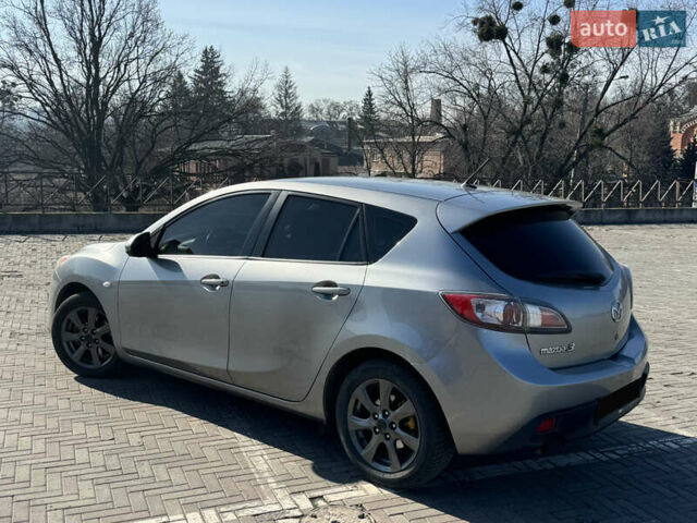 Сірий Мазда 3, об'ємом двигуна 1.56 л та пробігом 272 тис. км за 6000 $, фото 7 на Automoto.ua
