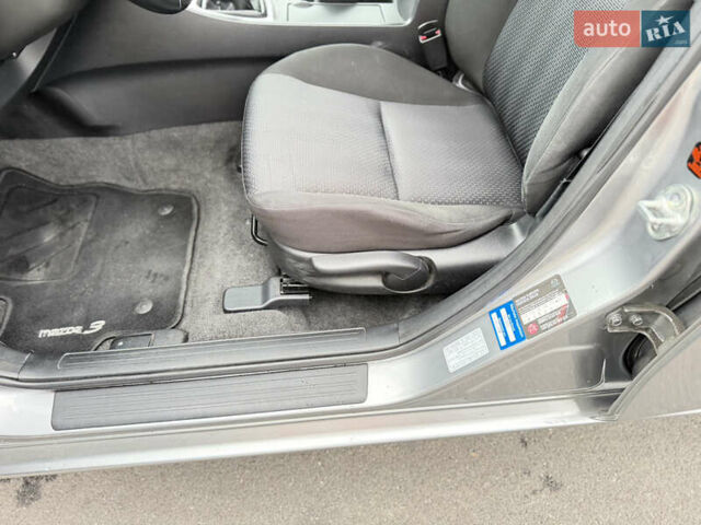 Серый Мазда 3, объемом двигателя 1.6 л и пробегом 75 тыс. км за 8450 $, фото 91 на Automoto.ua