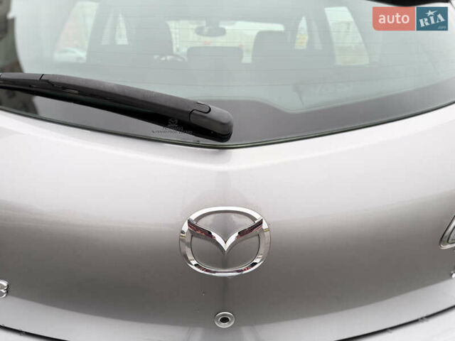 Серый Мазда 3, объемом двигателя 1.6 л и пробегом 75 тыс. км за 8450 $, фото 43 на Automoto.ua