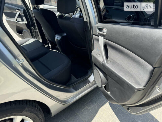 Сірий Мазда 3, об'ємом двигуна 2.18 л та пробігом 206 тис. км за 6999 $, фото 19 на Automoto.ua