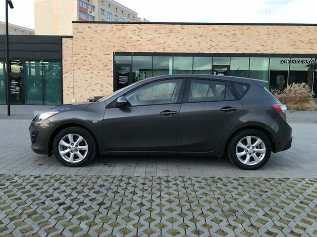 Серый Мазда 3, объемом двигателя 1.6 л и пробегом 264 тыс. км за 6500 $, фото 2 на Automoto.ua