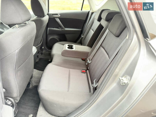 Серый Мазда 3, объемом двигателя 1.6 л и пробегом 75 тыс. км за 8750 $, фото 84 на Automoto.ua