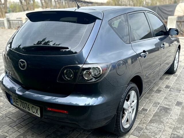Серый Мазда 3, объемом двигателя 1.6 л и пробегом 208 тыс. км за 5500 $, фото 3 на Automoto.ua