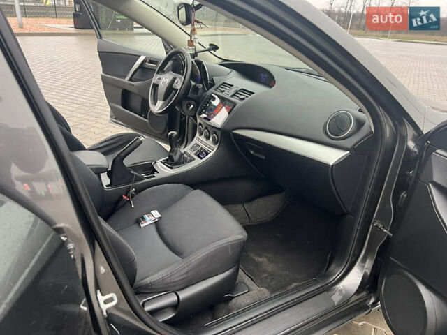 Сірий Мазда 3, об'ємом двигуна 1.6 л та пробігом 206 тис. км за 8500 $, фото 7 на Automoto.ua