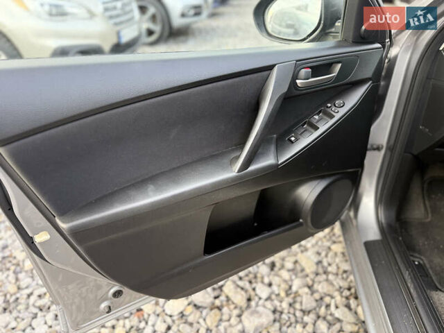 Серый Мазда 3, объемом двигателя 1.6 л и пробегом 229 тыс. км за 6750 $, фото 21 на Automoto.ua