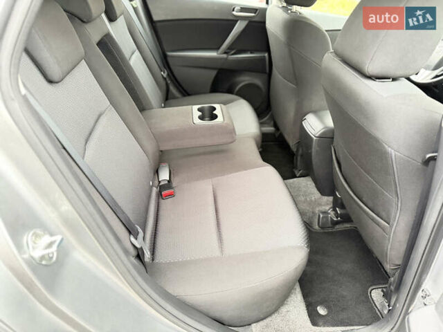 Серый Мазда 3, объемом двигателя 1.6 л и пробегом 75 тыс. км за 8450 $, фото 71 на Automoto.ua