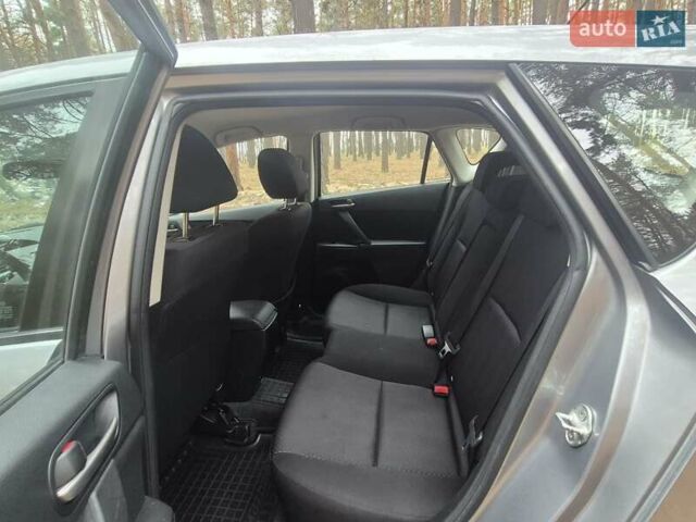 Серый Мазда 3, объемом двигателя 1.6 л и пробегом 190 тыс. км за 7000 $, фото 12 на Automoto.ua