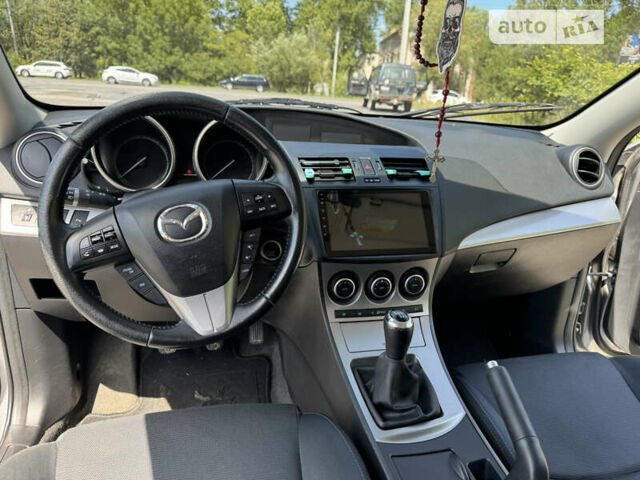 Сірий Мазда 3, об'ємом двигуна 2.18 л та пробігом 206 тис. км за 6999 $, фото 25 на Automoto.ua