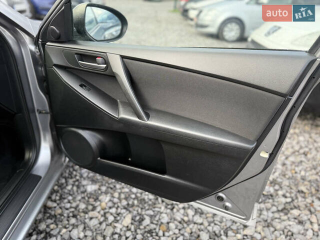 Серый Мазда 3, объемом двигателя 1.6 л и пробегом 229 тыс. км за 6750 $, фото 22 на Automoto.ua