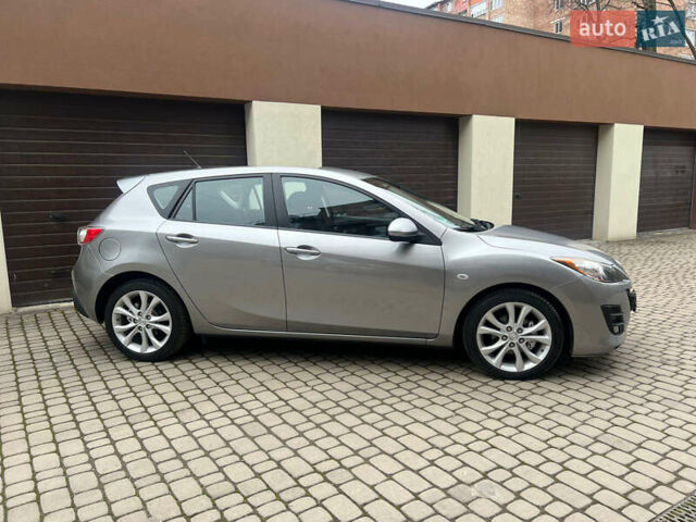 Сірий Мазда 3, об'ємом двигуна 1.6 л та пробігом 156 тис. км за 7599 $, фото 9 на Automoto.ua