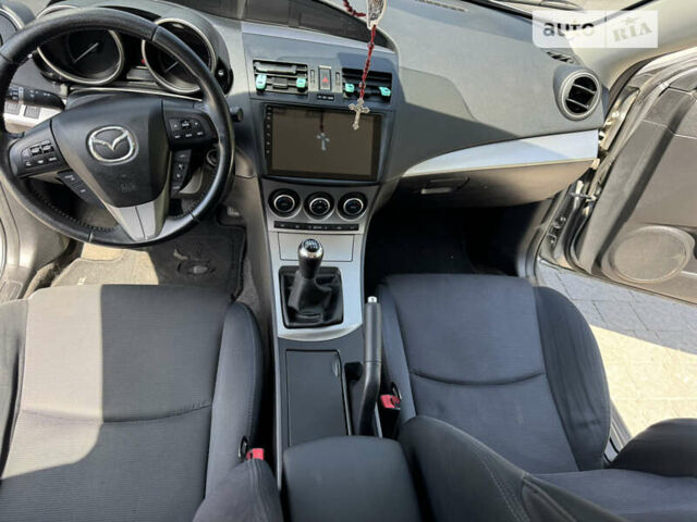 Сірий Мазда 3, об'ємом двигуна 2.18 л та пробігом 206 тис. км за 6999 $, фото 28 на Automoto.ua