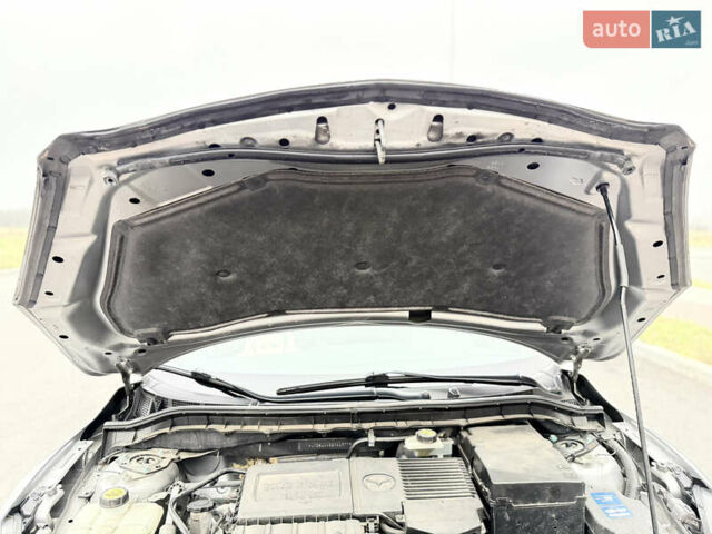 Серый Мазда 3, объемом двигателя 1.6 л и пробегом 75 тыс. км за 8750 $, фото 109 на Automoto.ua