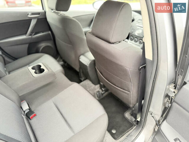 Серый Мазда 3, объемом двигателя 1.6 л и пробегом 75 тыс. км за 8750 $, фото 74 на Automoto.ua