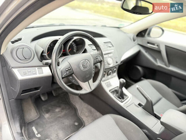 Серый Мазда 3, объемом двигателя 1.6 л и пробегом 75 тыс. км за 8450 $, фото 88 на Automoto.ua