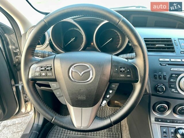 Сірий Мазда 3, об'ємом двигуна 1.6 л та пробігом 185 тис. км за 6850 $, фото 23 на Automoto.ua
