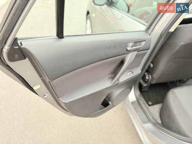 Серый Мазда 3, объемом двигателя 1.6 л и пробегом 75 тыс. км за 8450 $, фото 85 на Automoto.ua