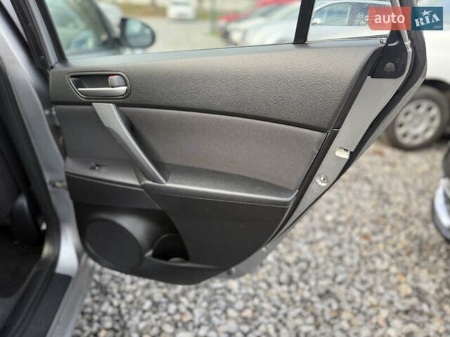Серый Мазда 3, объемом двигателя 1.6 л и пробегом 229 тыс. км за 6750 $, фото 20 на Automoto.ua