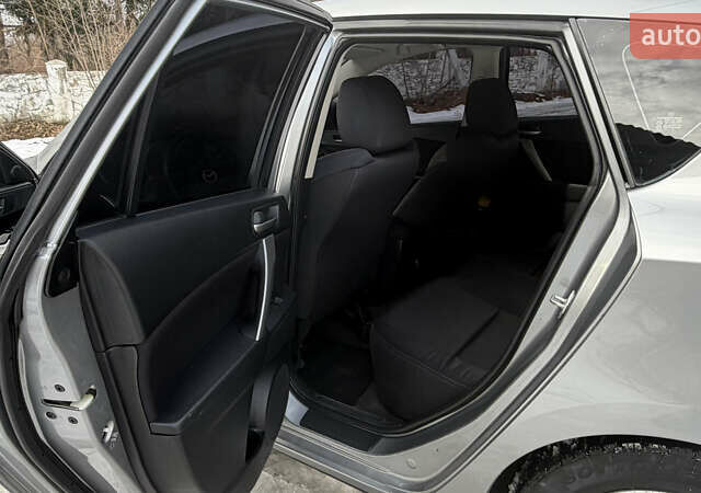 Сірий Мазда 3, об'ємом двигуна 2.18 л та пробігом 213 тис. км за 5999 $, фото 9 на Automoto.ua