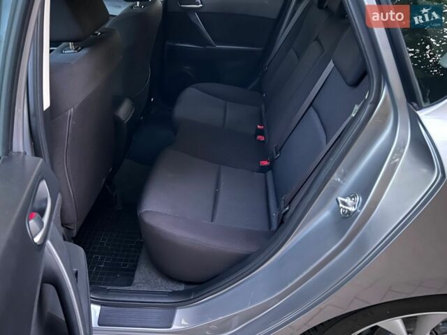 Сірий Мазда 3, об'ємом двигуна 1.6 л та пробігом 156 тис. км за 7199 $, фото 30 на Automoto.ua