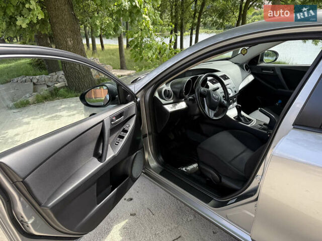 Серый Мазда 3, объемом двигателя 1.6 л и пробегом 194 тыс. км за 7850 $, фото 8 на Automoto.ua