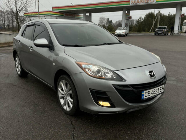 Серый Мазда 3, объемом двигателя 2.2 л и пробегом 259 тыс. км за 6599 $, фото 10 на Automoto.ua
