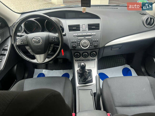 Сірий Мазда 3, об'ємом двигуна 1.6 л та пробігом 156 тис. км за 7599 $, фото 16 на Automoto.ua