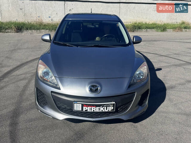 Серый Мазда 3, объемом двигателя 2 л и пробегом 190 тыс. км за 7999 $, фото 3 на Automoto.ua