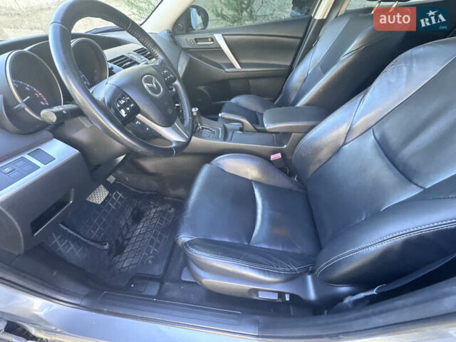 Серый Мазда 3, объемом двигателя 2 л и пробегом 190 тыс. км за 7999 $, фото 20 на Automoto.ua