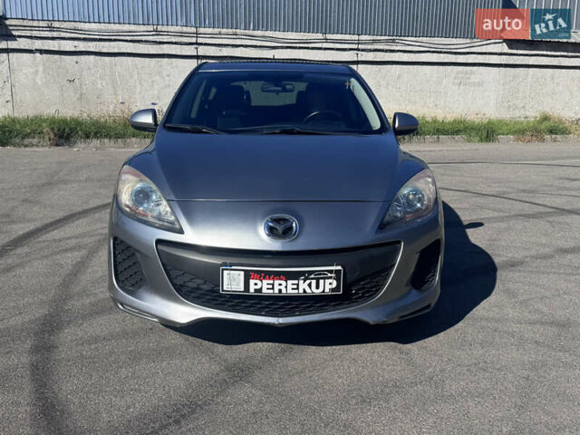 Серый Мазда 3, объемом двигателя 2 л и пробегом 190 тыс. км за 7999 $, фото 2 на Automoto.ua