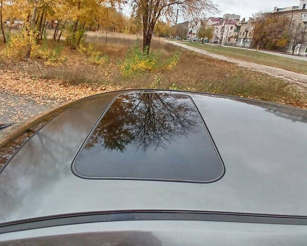 Серый Мазда 3, объемом двигателя 2 л и пробегом 195 тыс. км за 7200 $, фото 12 на Automoto.ua