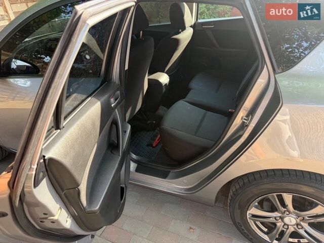 Сірий Мазда 3, об'ємом двигуна 1.6 л та пробігом 184 тис. км за 7100 $, фото 9 на Automoto.ua