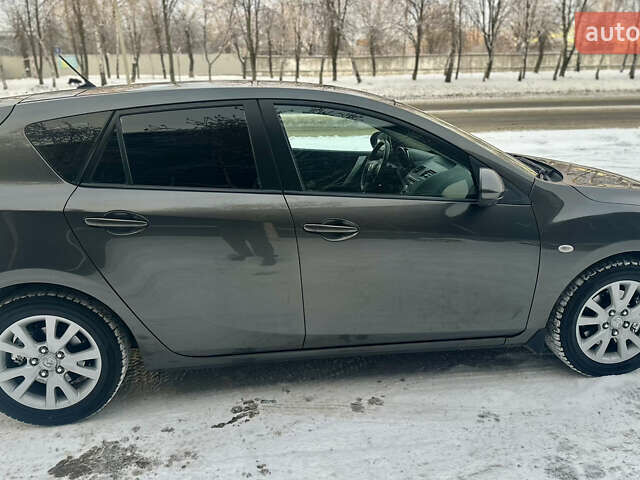 Серый Мазда 3, объемом двигателя 2 л и пробегом 187 тыс. км за 7999 $, фото 4 на Automoto.ua