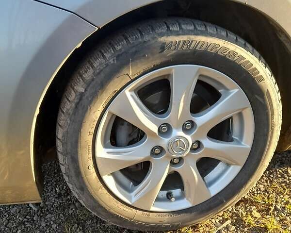 Серый Мазда 3, объемом двигателя 1.6 л и пробегом 157 тыс. км за 7300 $, фото 14 на Automoto.ua