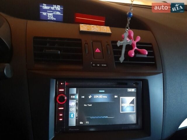 Серый Мазда 3, объемом двигателя 1.56 л и пробегом 158 тыс. км за 6500 $, фото 6 на Automoto.ua